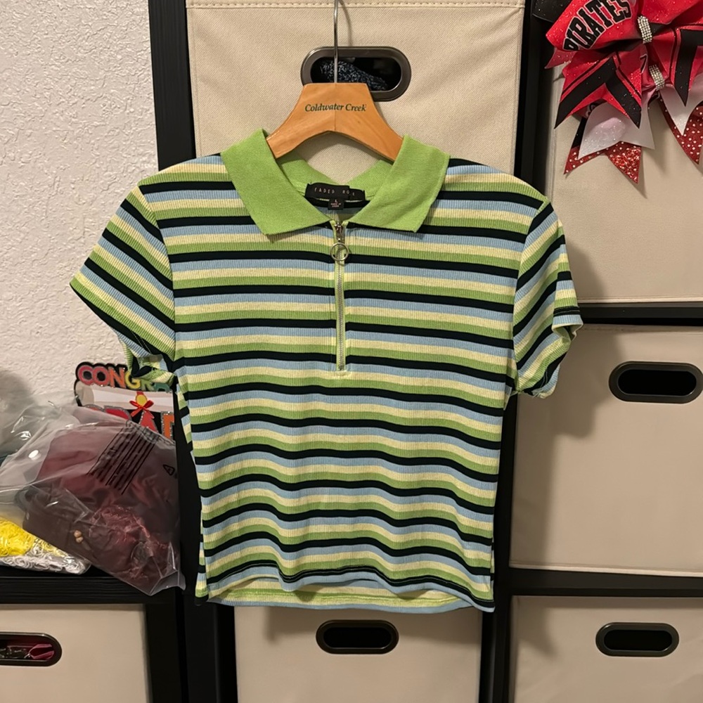 Multi color stripped crop top. Never been worn. Comfy and stretchy